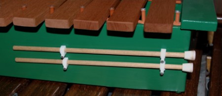 Keep xylophone mallets clipped to the box
